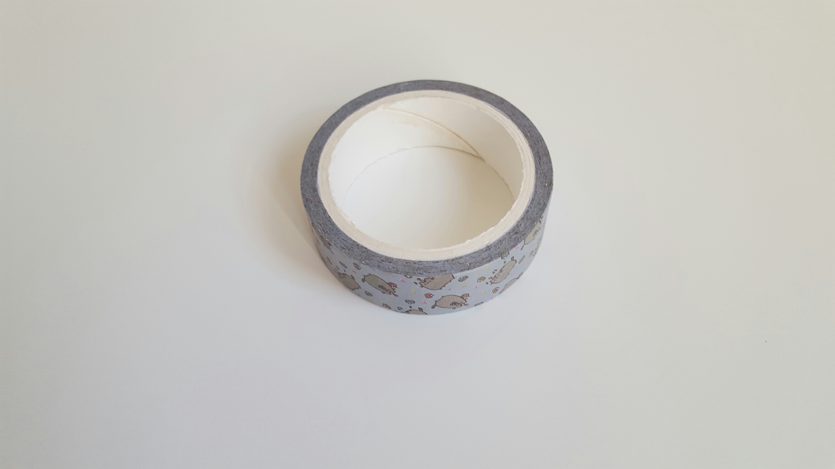 A close-up of the design of the Pusheen tape