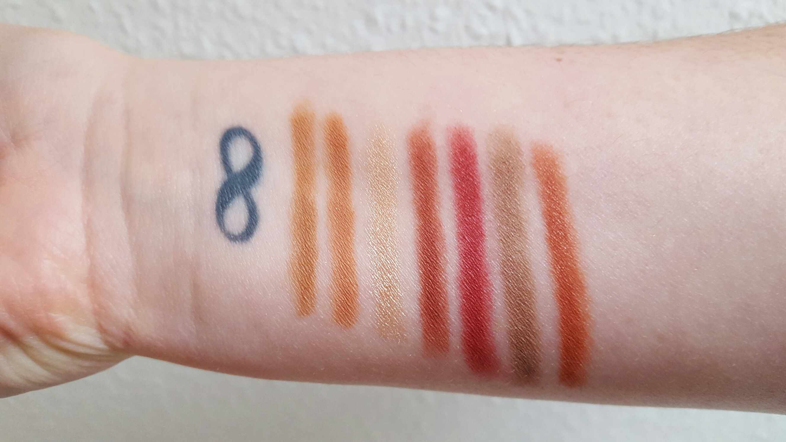 Swatches of the bottom row of 7 shades
