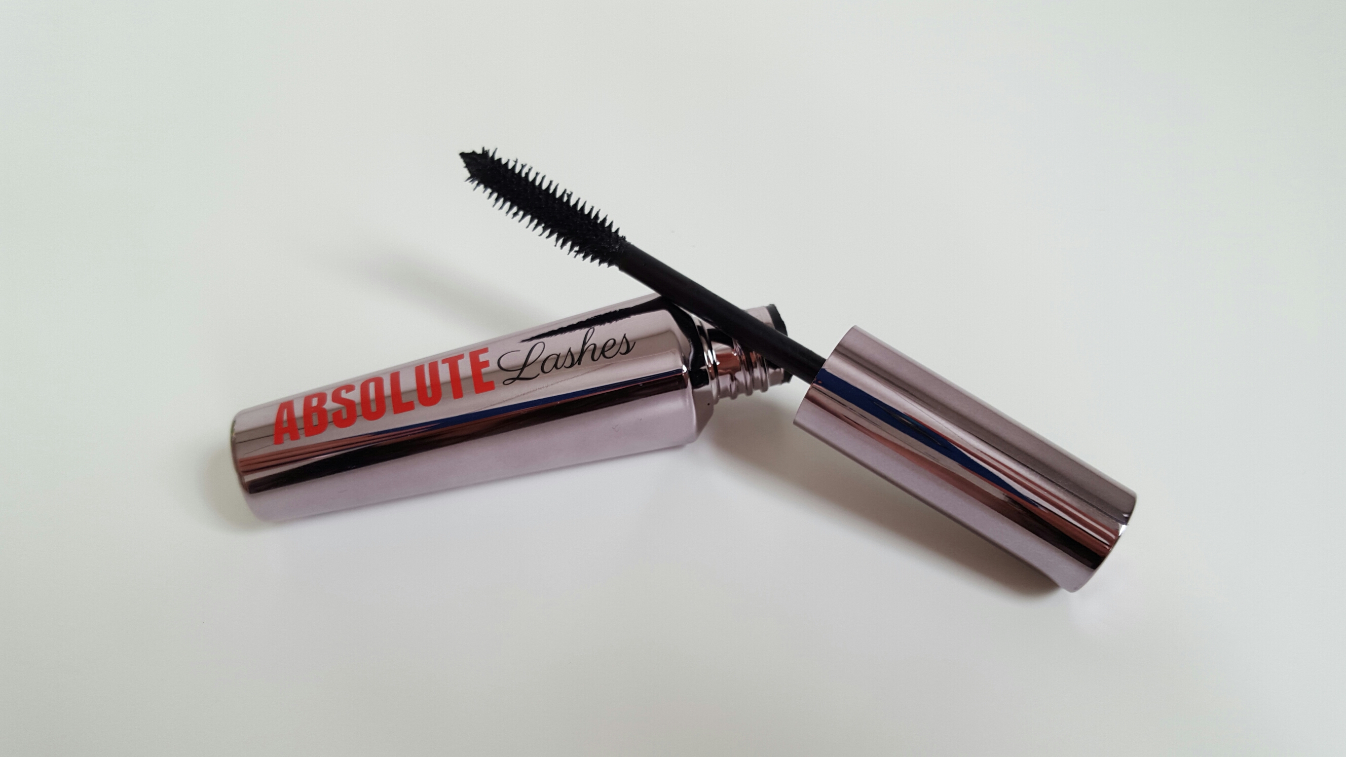 The W7 Absolute Lashes Mascara which is a shiny silver tube with red and black lettering on the side