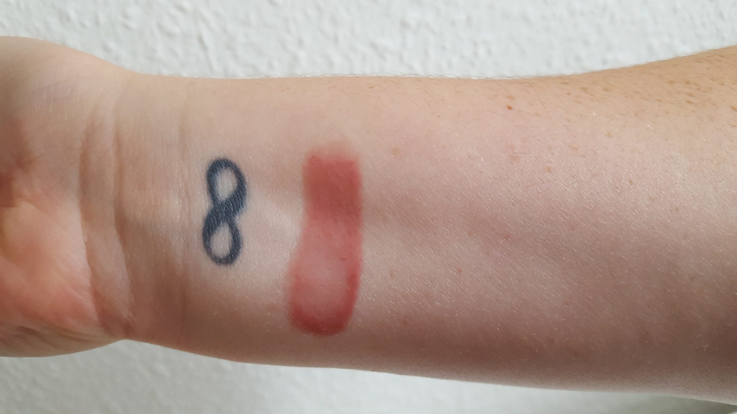 A swatch of the Dolly shade of the Buxom Full-On Lip Cream