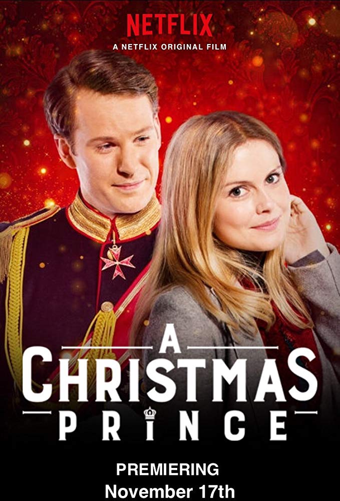 A Christmas Prince Netflix movie poster. The poster shows the journalist smiling and looking forward while the prince is looking at her. 