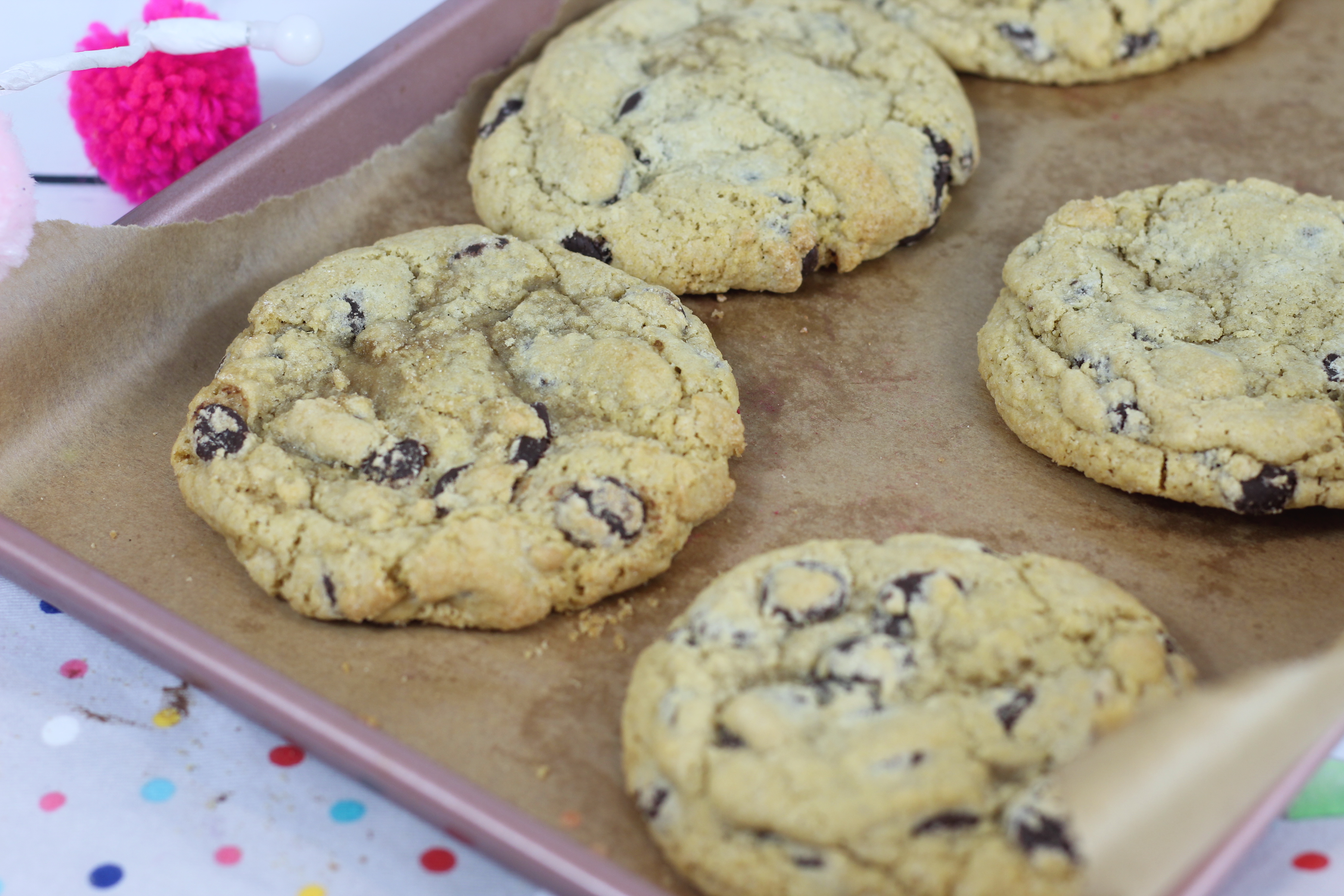 A sheetpan of baked dairy free chocolate chip cookies