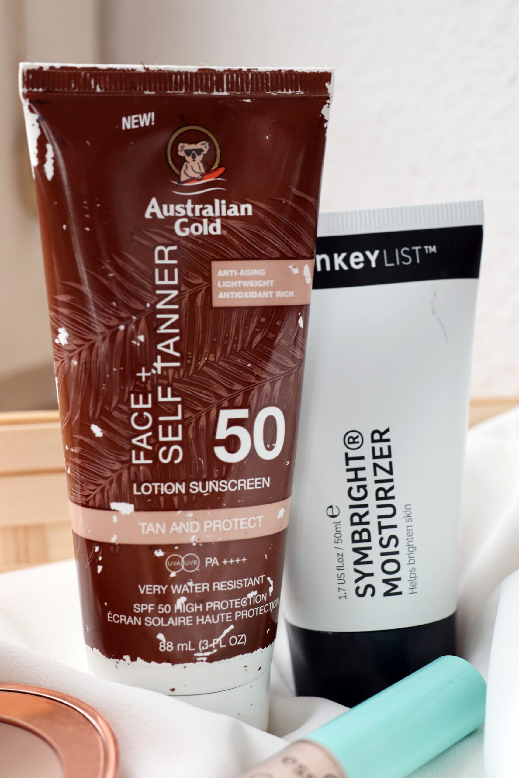 The Australian Gold SPF 50 Sunscreen and The Inkey List Symbright Moisturizer