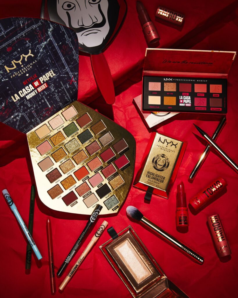 The NYX Money Heist collection including the 2 eyeshadow palettes, the 2 highlighters, the 2 lipsticks, 5 eyeliners, and ink liner. 