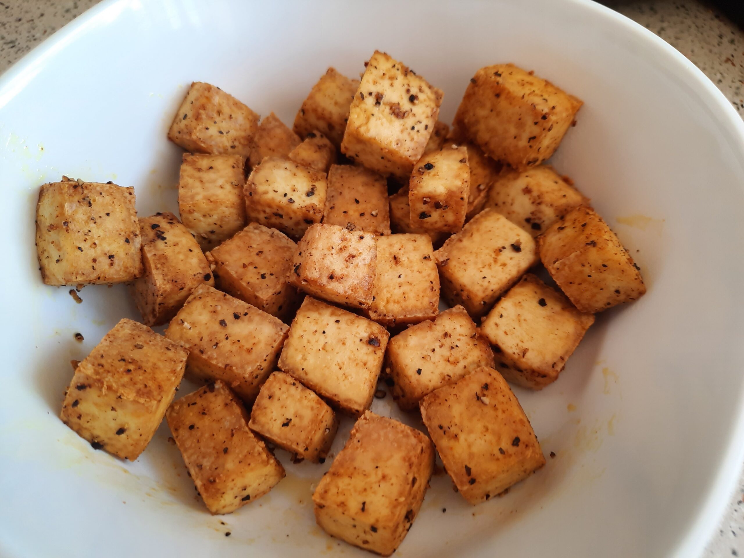 Tofu pieces I made in the air fryer with salt, pepper, chili powder, and turmeric
