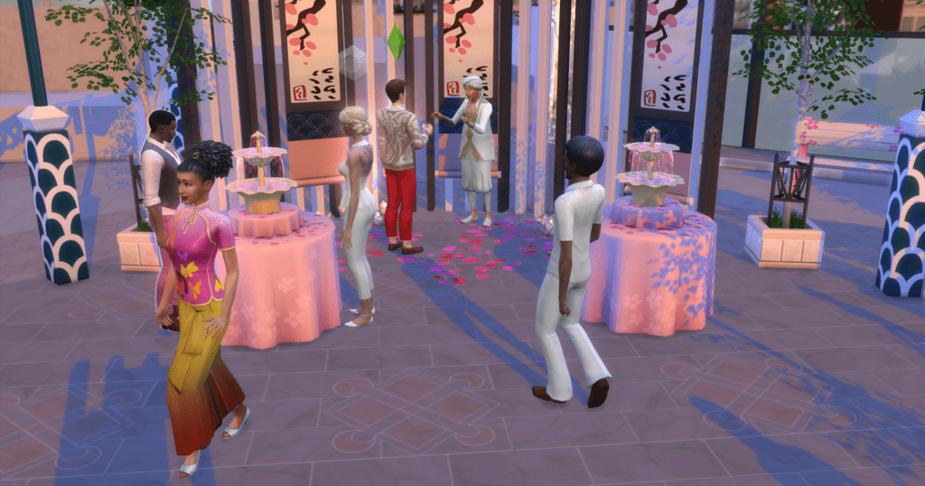 My sims at the Romance Festival in City Living. One sim is getting a drink at the fountain while another sim is talking to the love guru.