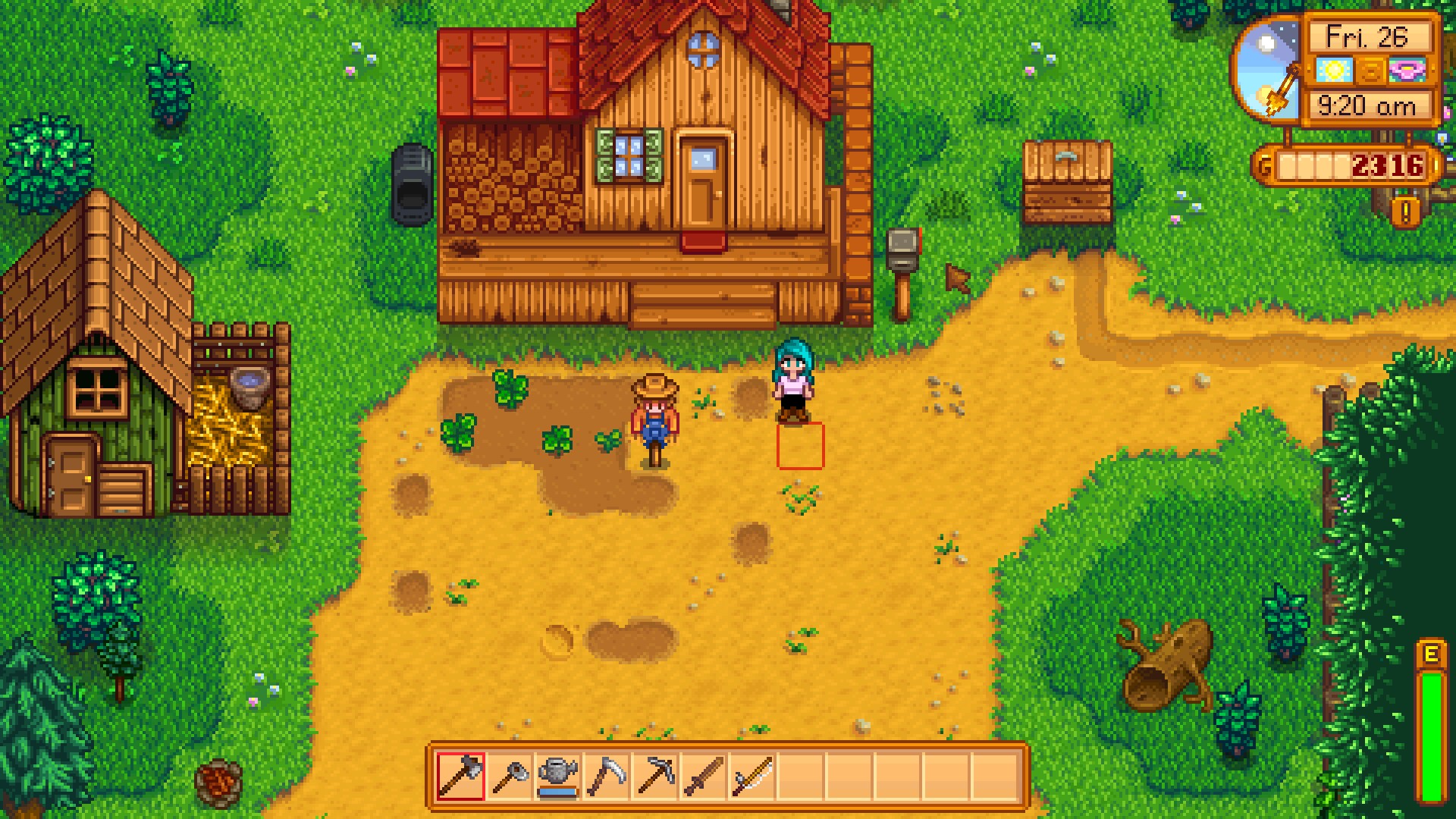 A screenshot from Stardew Valley. My character is standing outside of her house by her small crop field. 