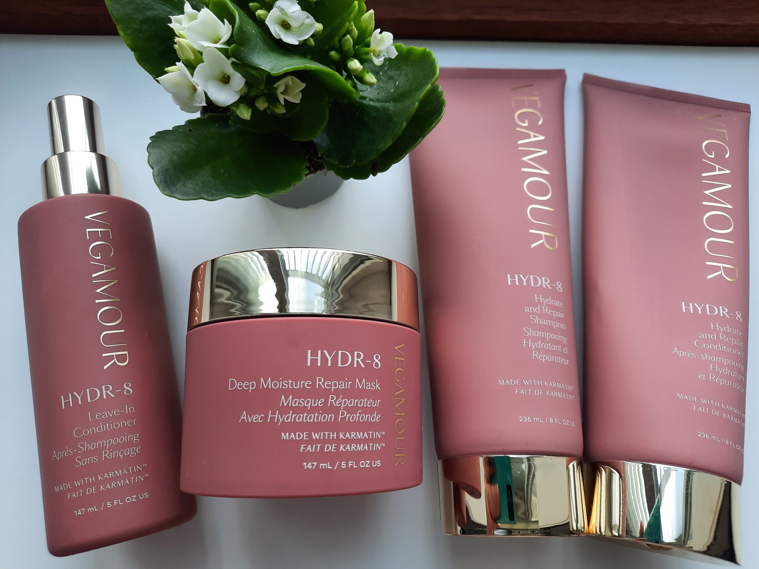 The Vegamour Hydr-8 complete repair kit, which includes a shampoo, conditioner, mask, and leave-in conditioner 