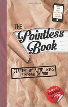 The cover of The Pointless Book by Alfie Deyes. The cover shows a lined paper that is covered with brown paper and ripped off. 