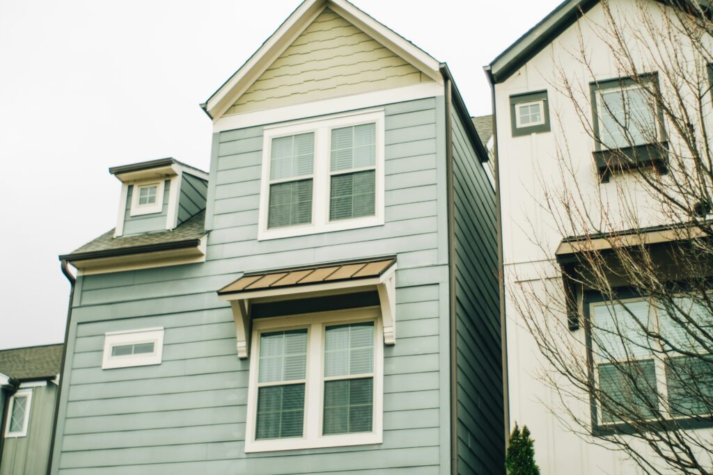 A home with blue and yellow siding 