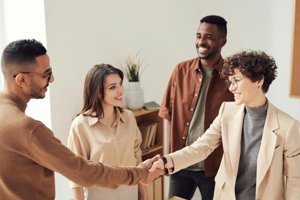A man and woman handshaking