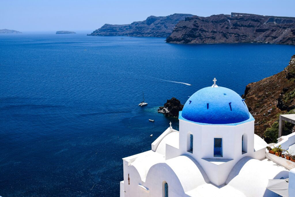 A view from the white church with a blue roof in Santorini