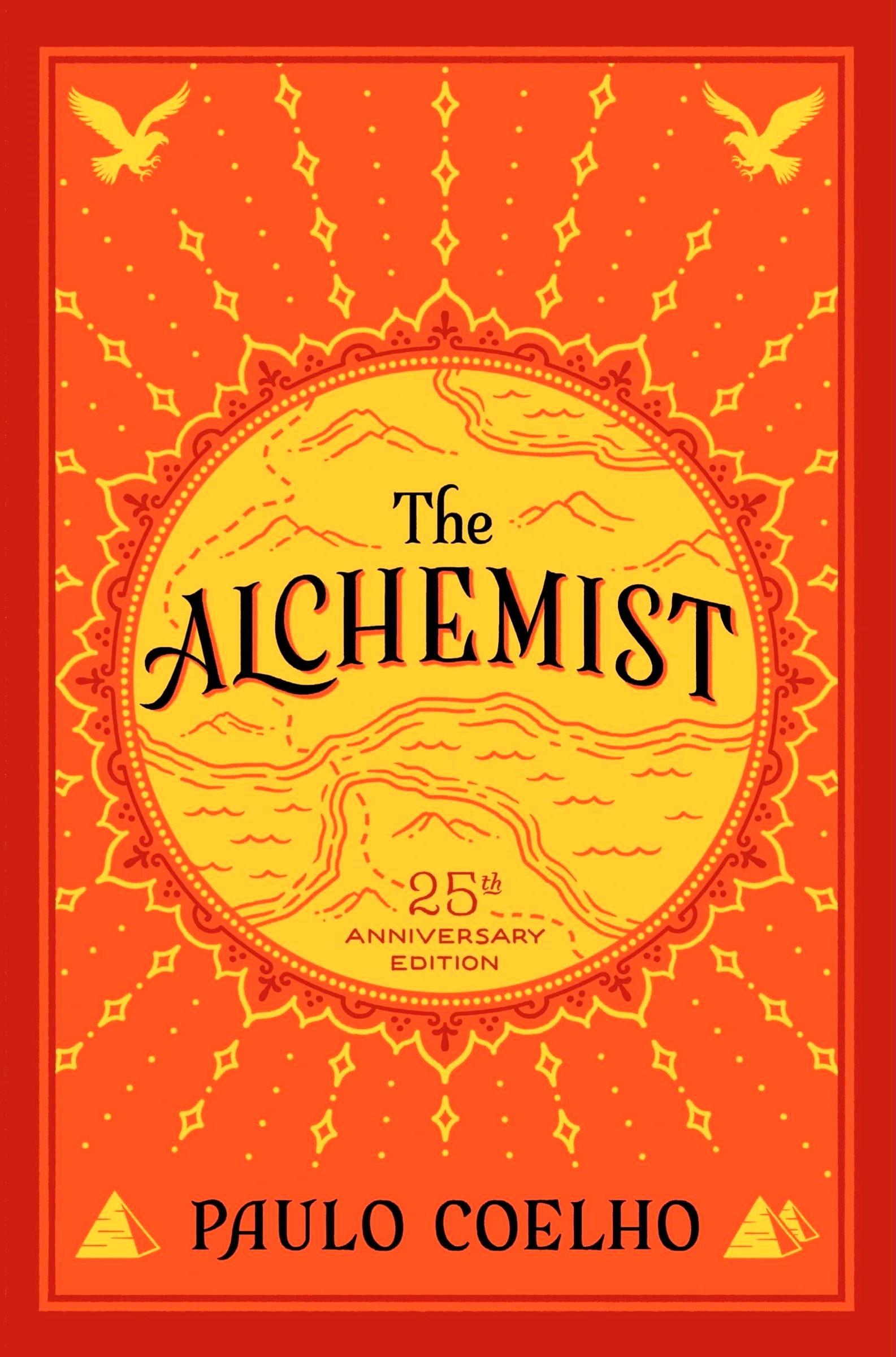 The cover of The Alchemist by Paulo Coelho that depicts an illustrated map that is surrounded by decorative elements