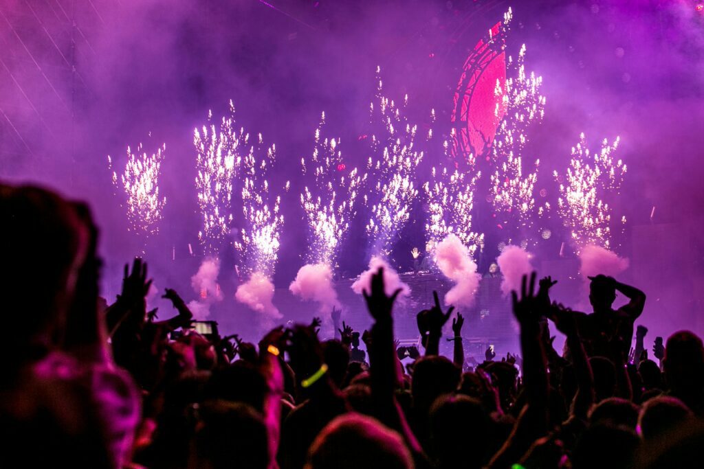 A group of people watching a fireworks shows