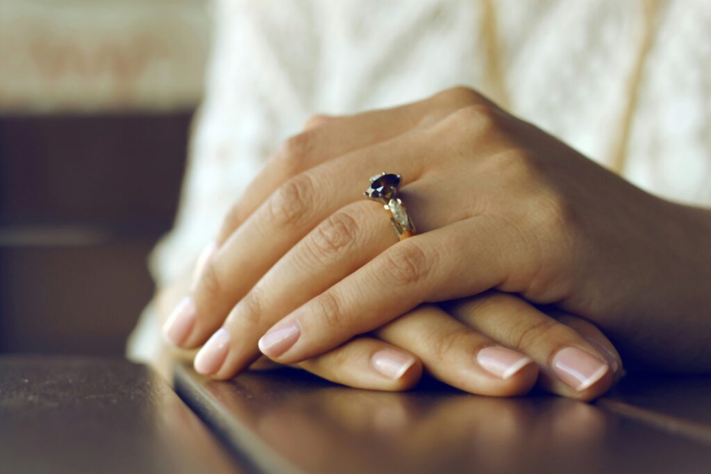 A close up of a pair of manicured hands
