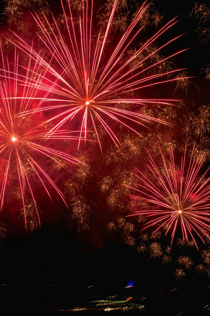 Red fireworks in the night sky
