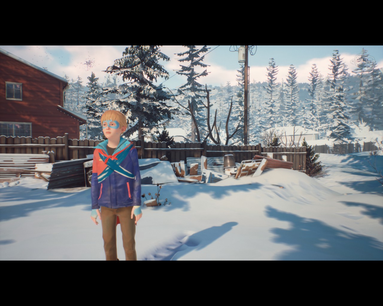 A screenshot from The Awesome Adventures of Captain Spirit where Chris is dressed up as Captain Spirit and standing in his backyard that is covered in snow
