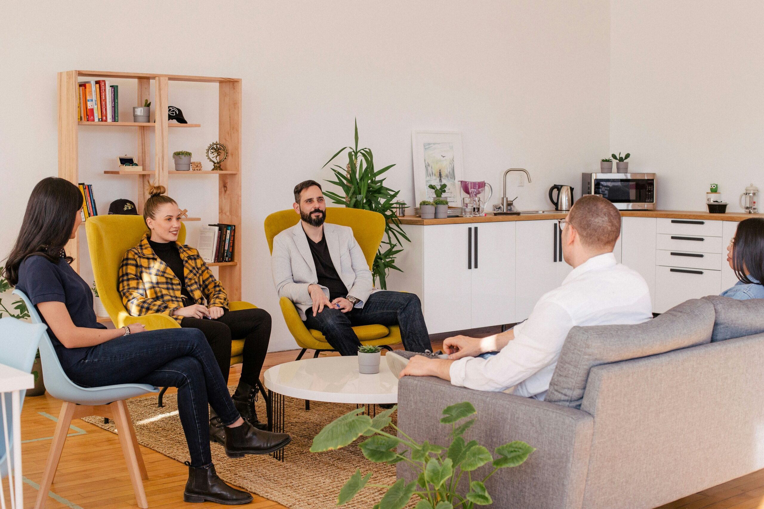 A group of people meeting in an office