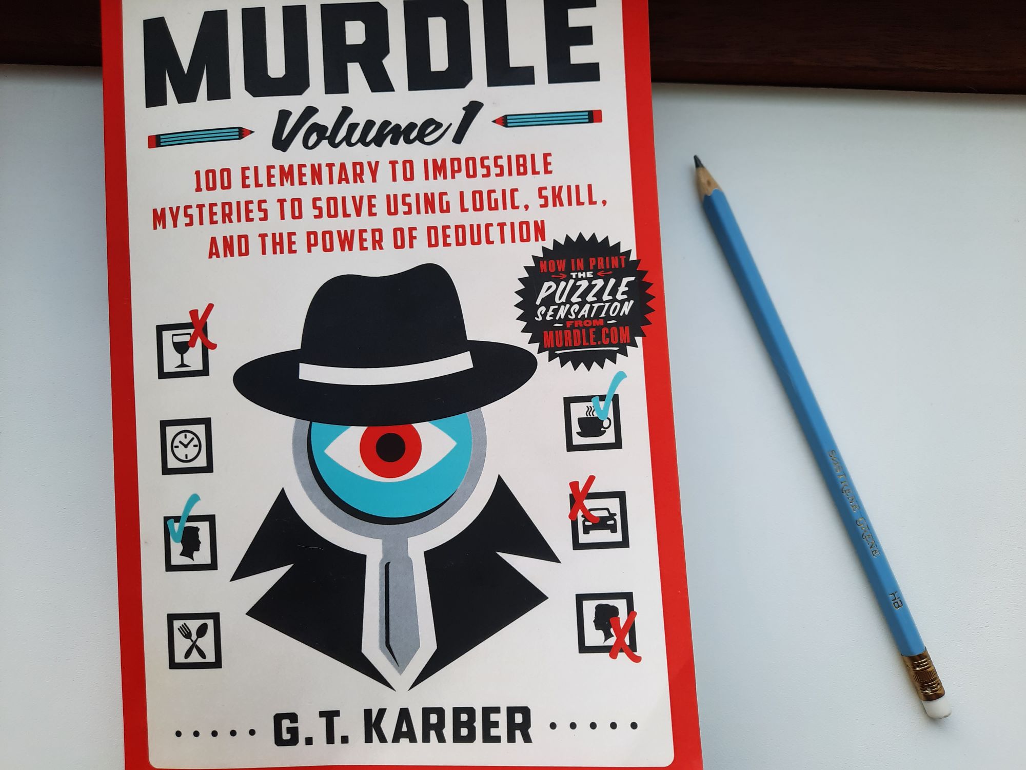 Murdle Volume 1 by G. T. Karber which is a collection of 100 logic puzzles