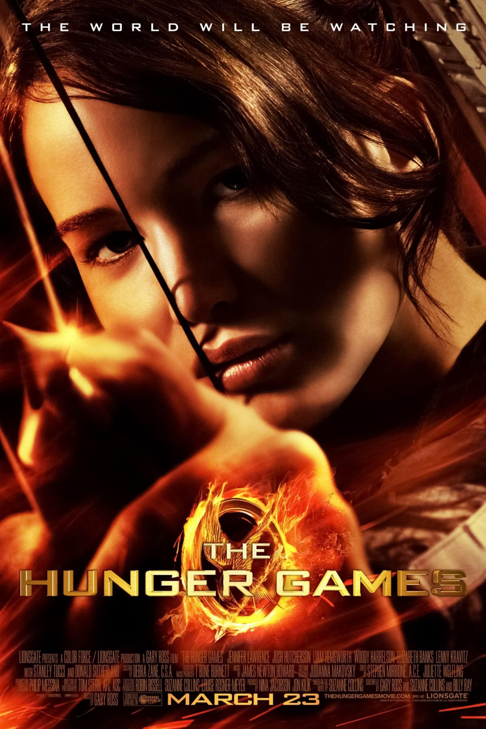 The movie poster for The Hunger Games with a close up of Jennifer Lawrence holding a bow and arrow