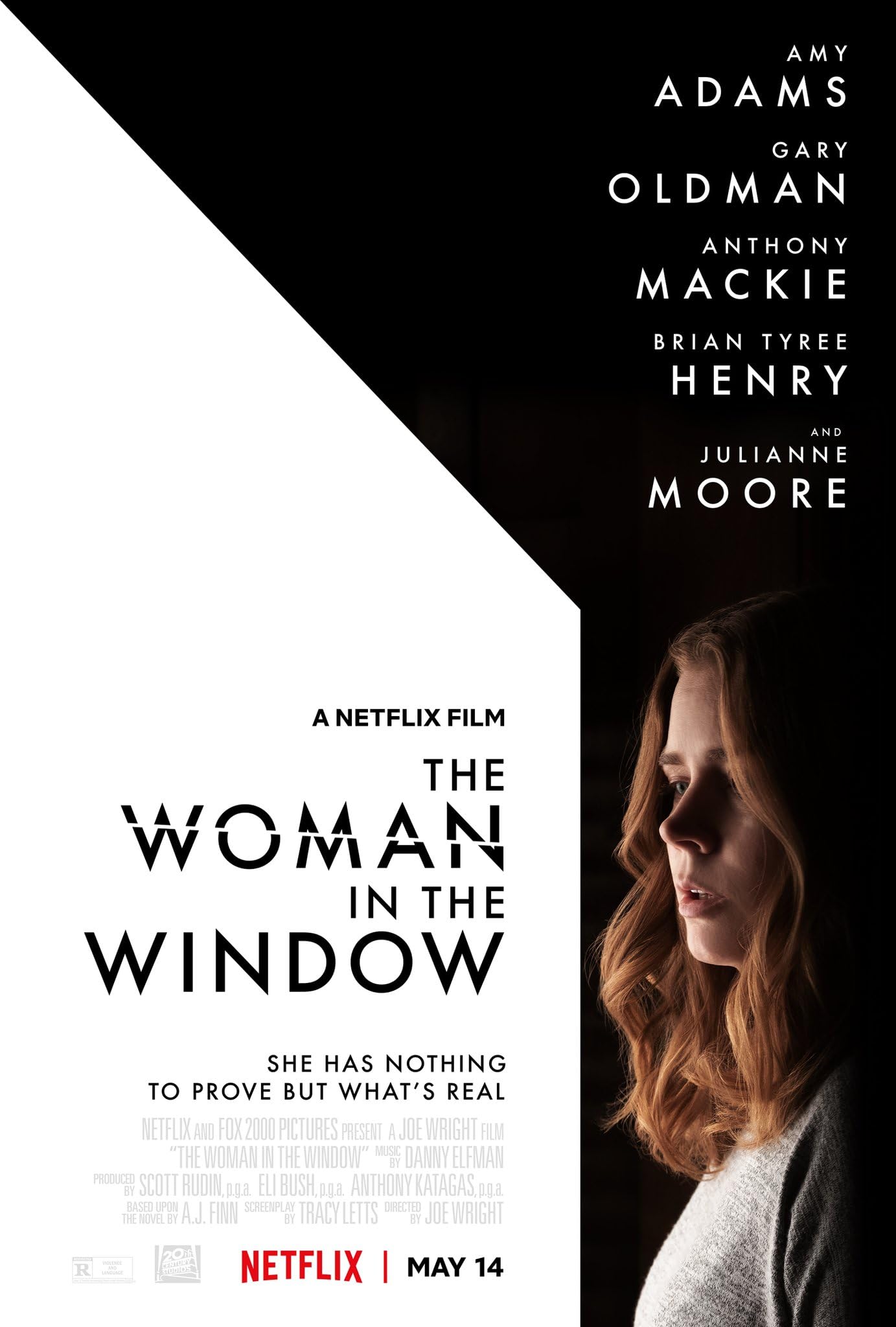 The movie poster of The Woman in the Window of a side profile of Amy Adams