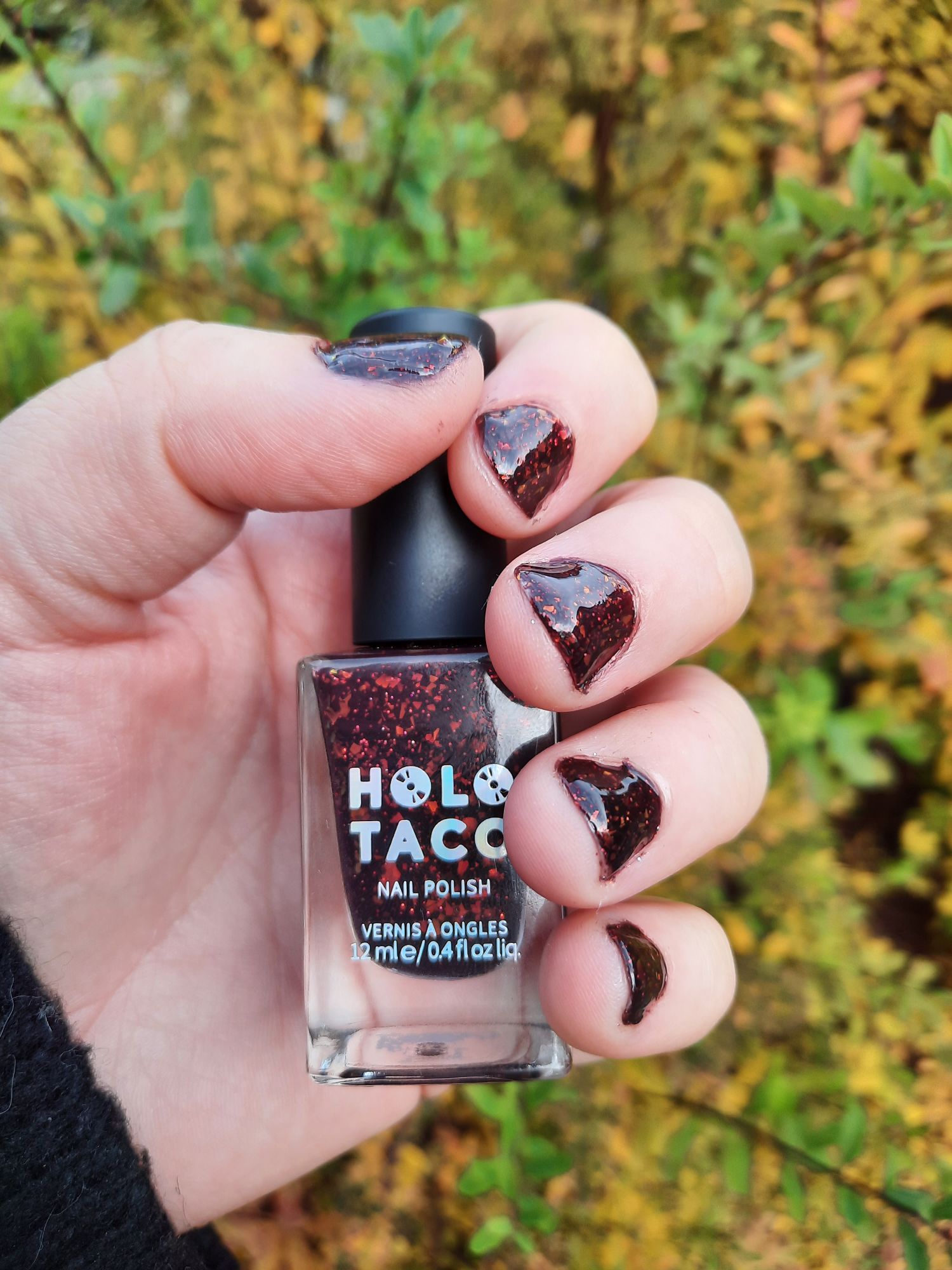 The Simply Deceased nail polish painted on my nails