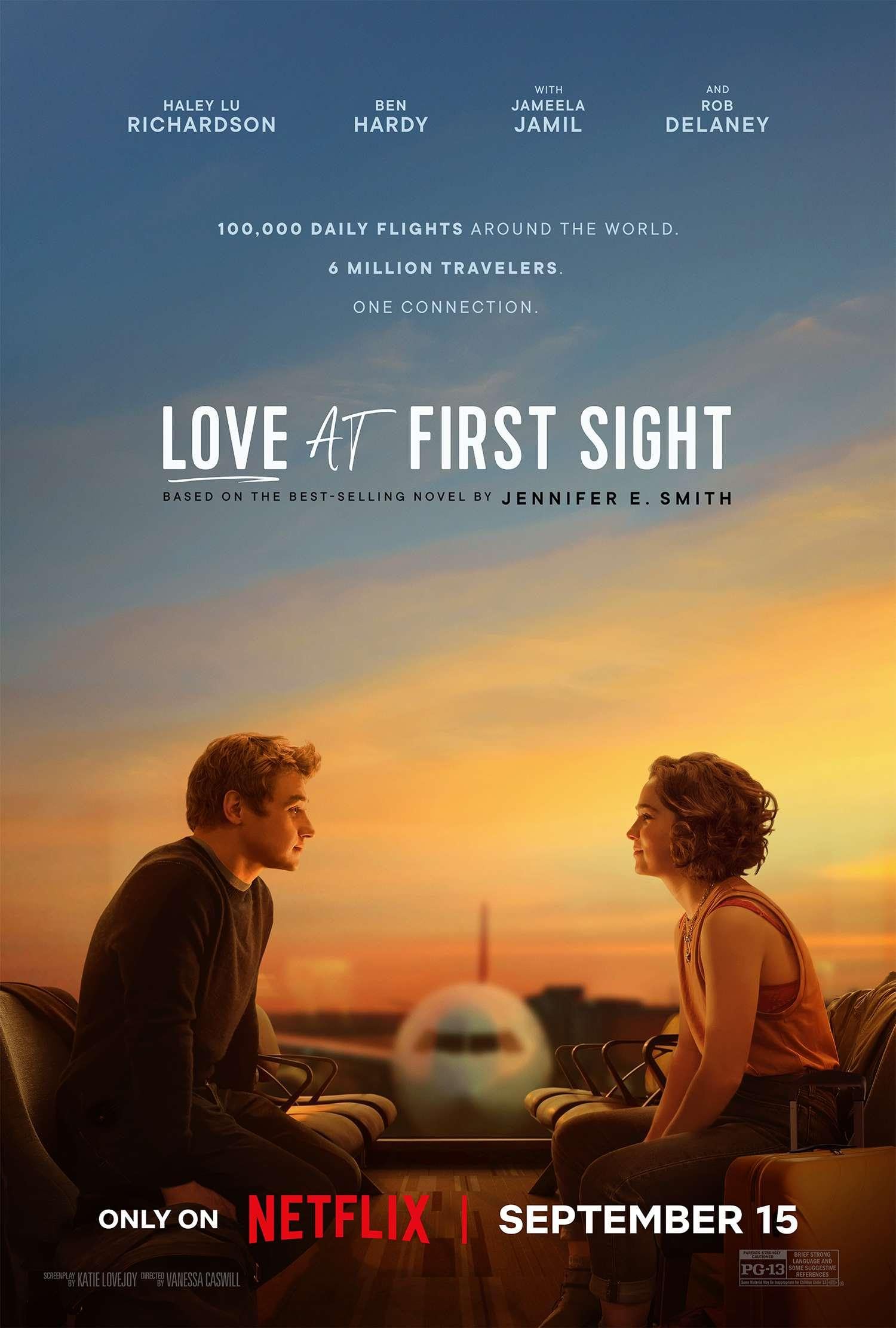 Love at First Sight movie poster with Oliver and Hadley sitting and looking at each other with a plane in the background